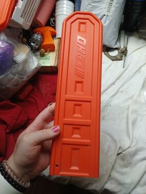 ECHO orange plastic scabbard designed to protect chainsaw blades 14"